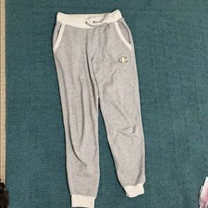 Champion Grey sweatpants with white detailing.